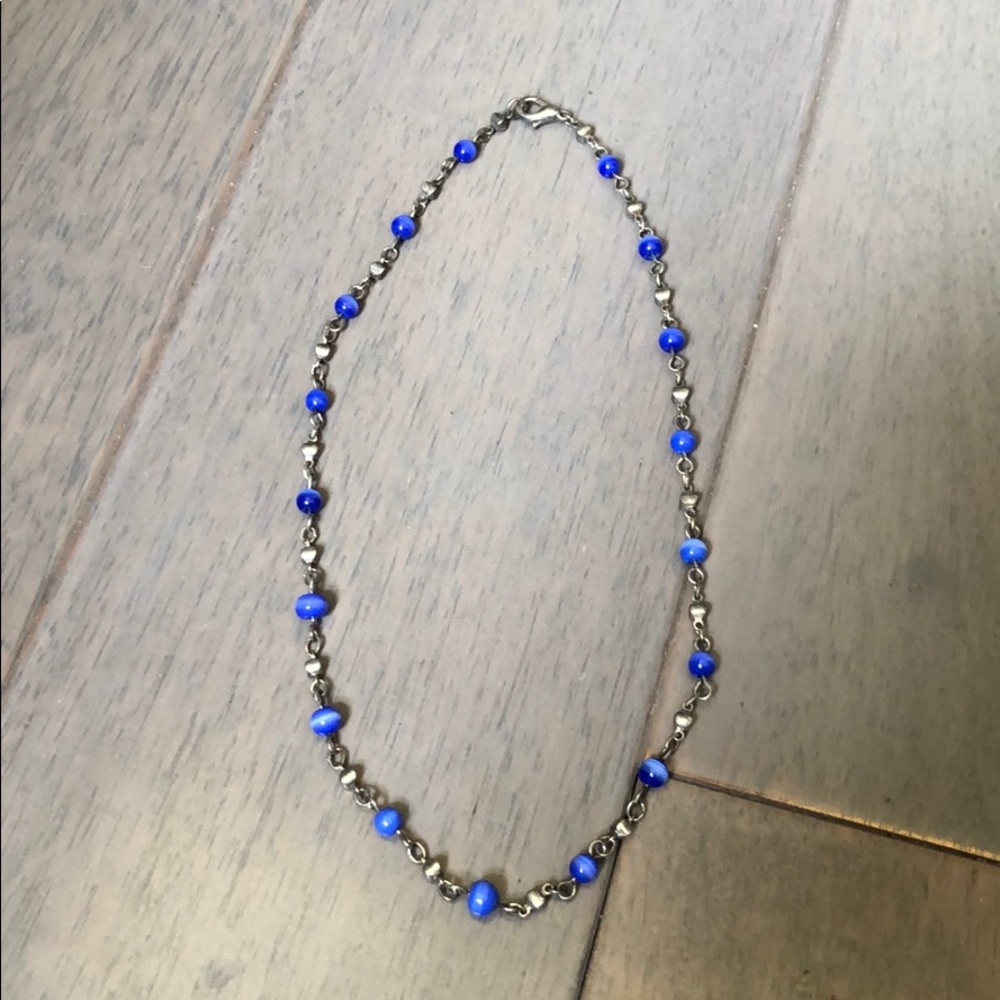 Blue bead & silver-tone necklace. 16 inches long.
